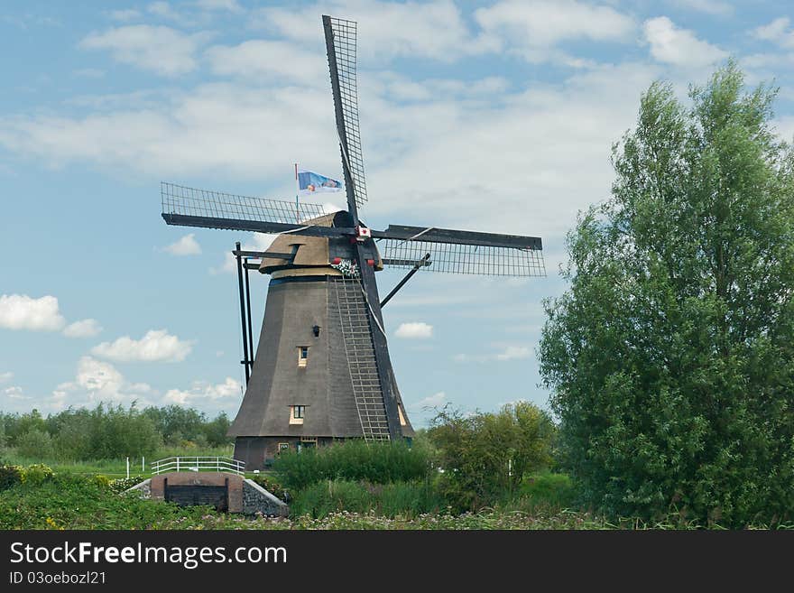 Windmill Near Kinderdijk In NL (UN World Heritage)