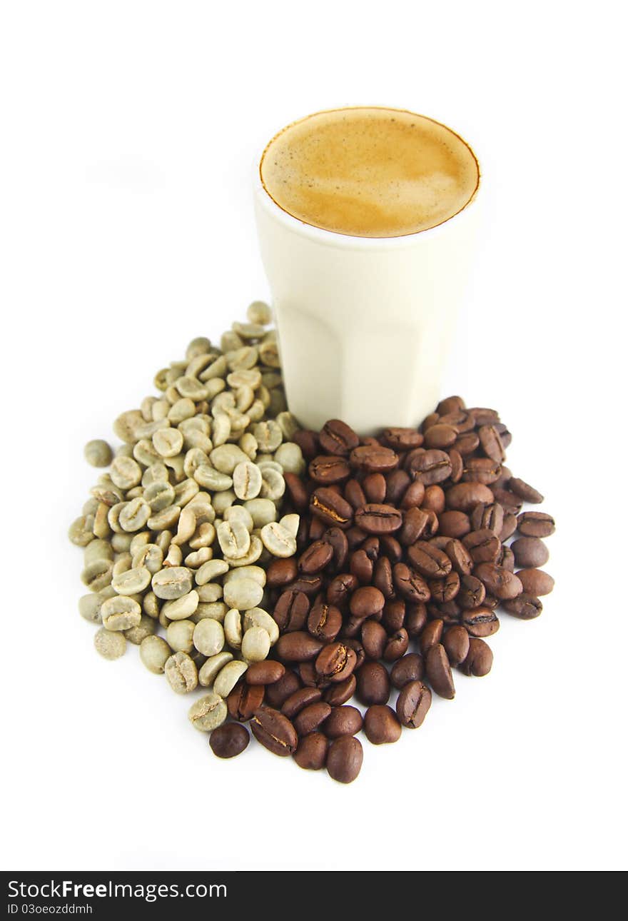 Cup of Espresso Coffee with Raw Green and Fresh Roasted Beans Isolated Over White