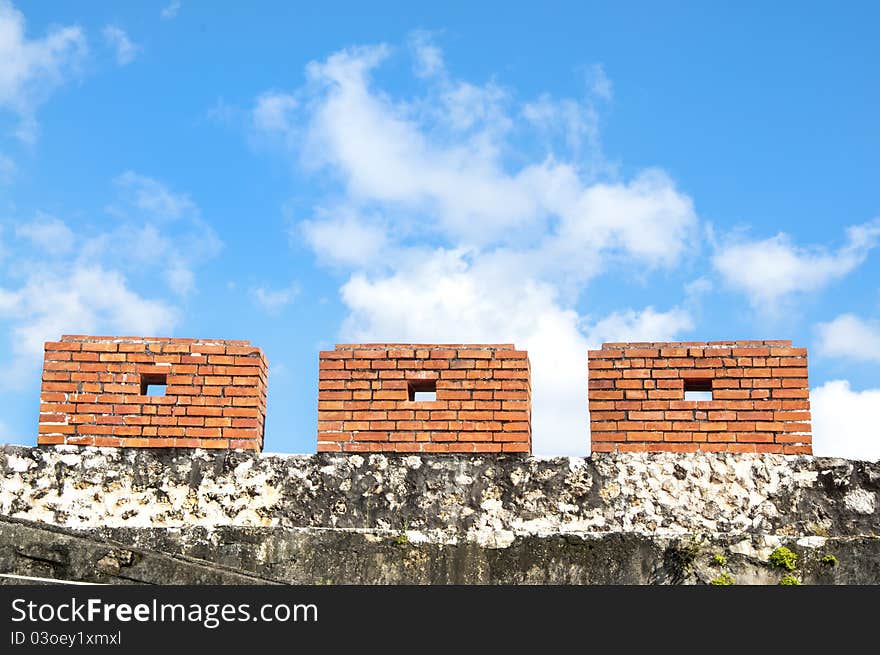 Ancient city wall is 100 years ago (before 1911)，Gun fire on the enemy in the above hole. Ancient city wall is 100 years ago (before 1911)，Gun fire on the enemy in the above hole