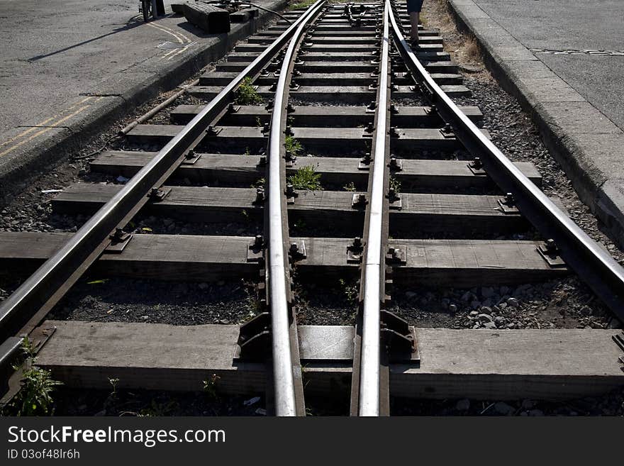 Railway Track Junction with Person in Background