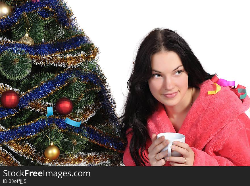 Girl With Cup In Bathrobe Next Christmas Tree