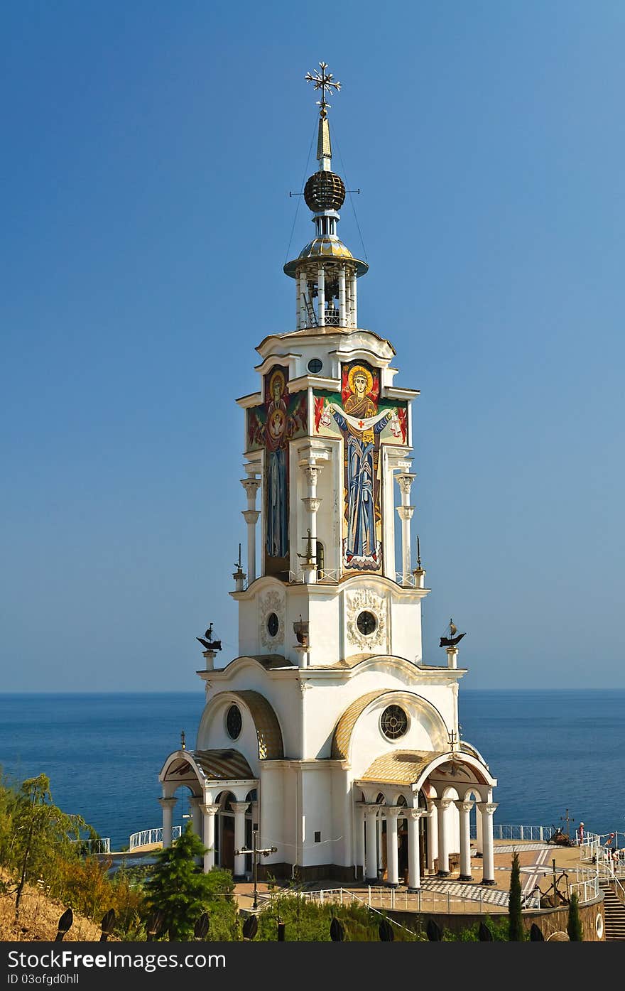 Church on the beach. Summer blue sky and sea