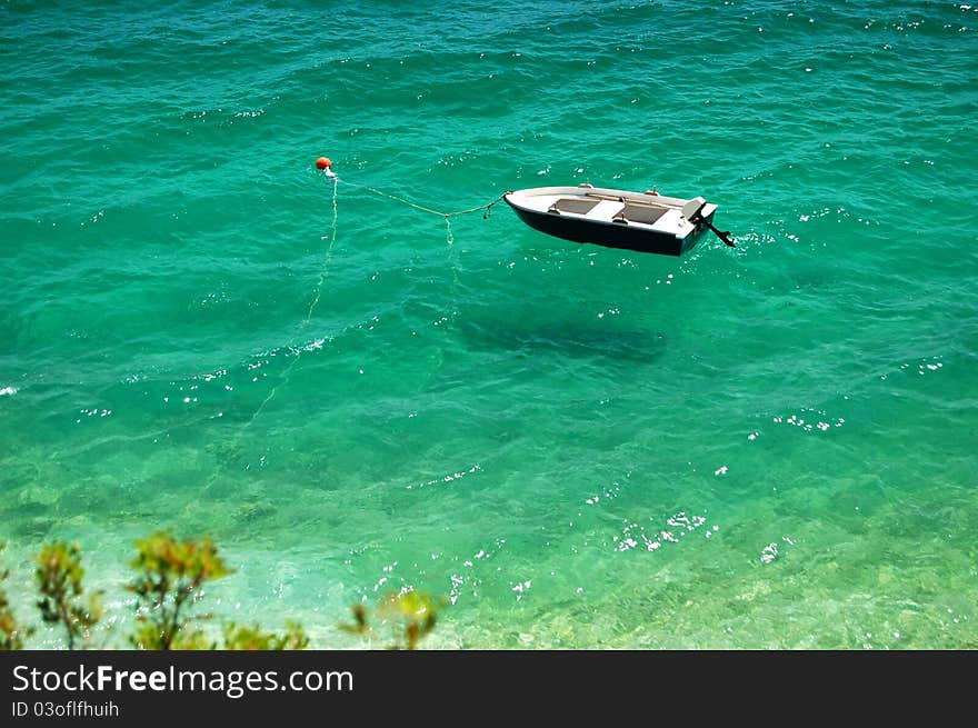 Lonely boat on dalmatian coast of Croatia