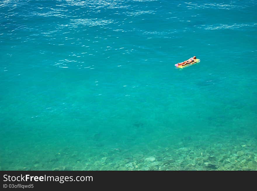 Sunbathing On Adriatic Waters