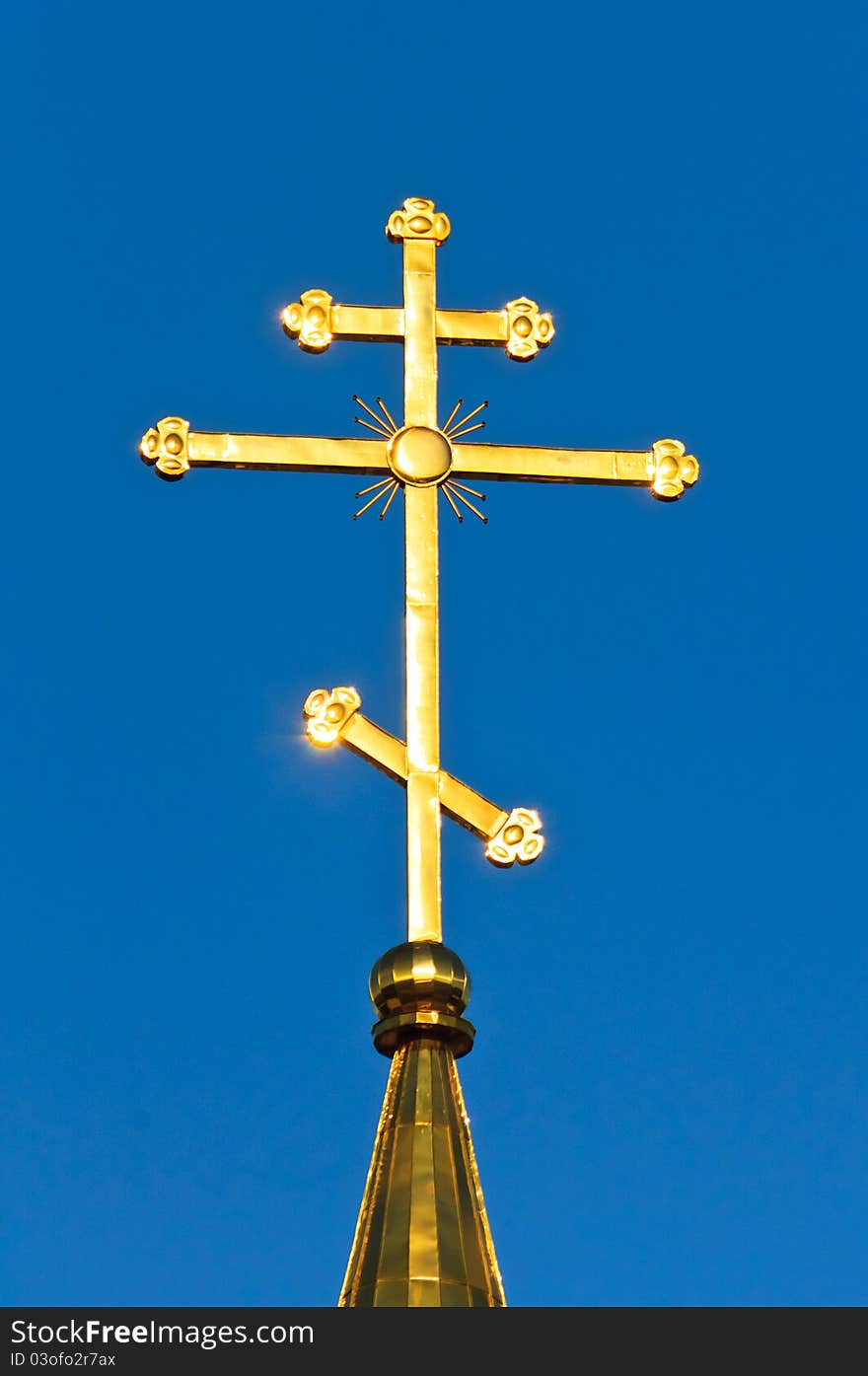 The church against the blue sky. Summer blue sky Orthodox Church