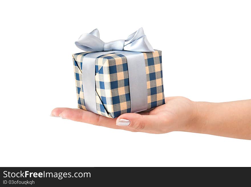 Gift box with ribbon in hand