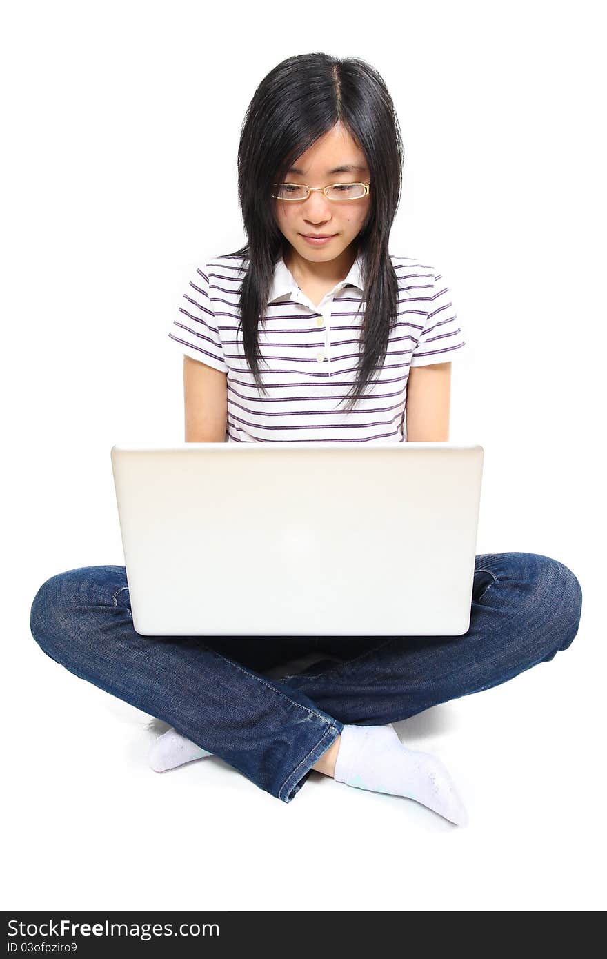 Young chinese woman sitting on the floor