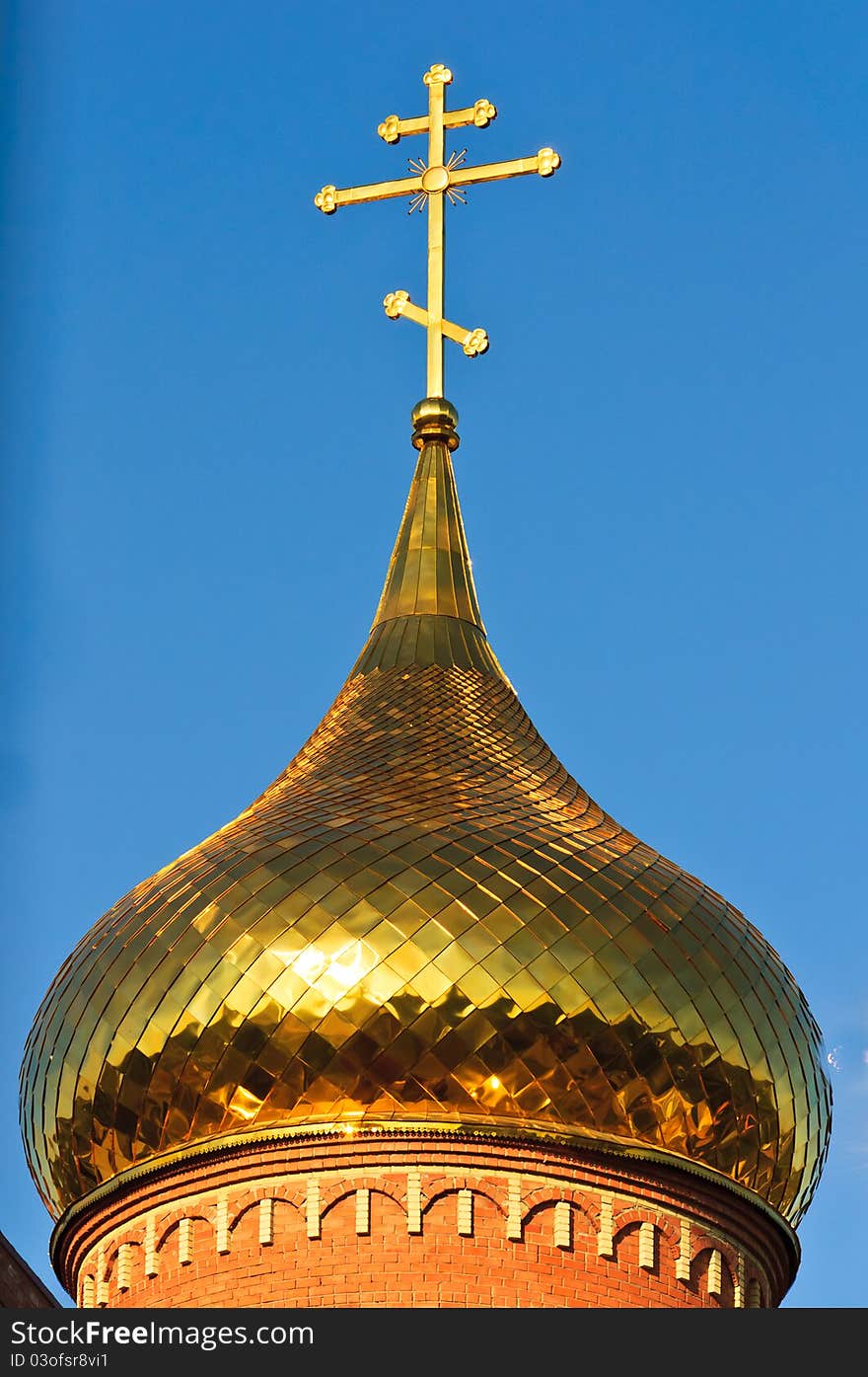 The church against the blue sky. Summer blue sky Orthodox Church