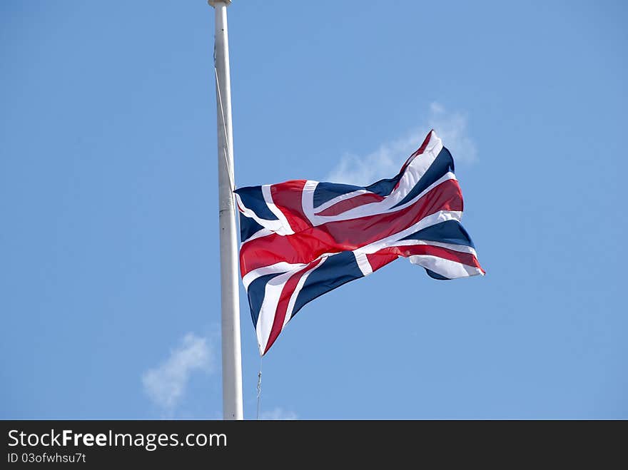 A British Union Jack Flag flying in a breeze