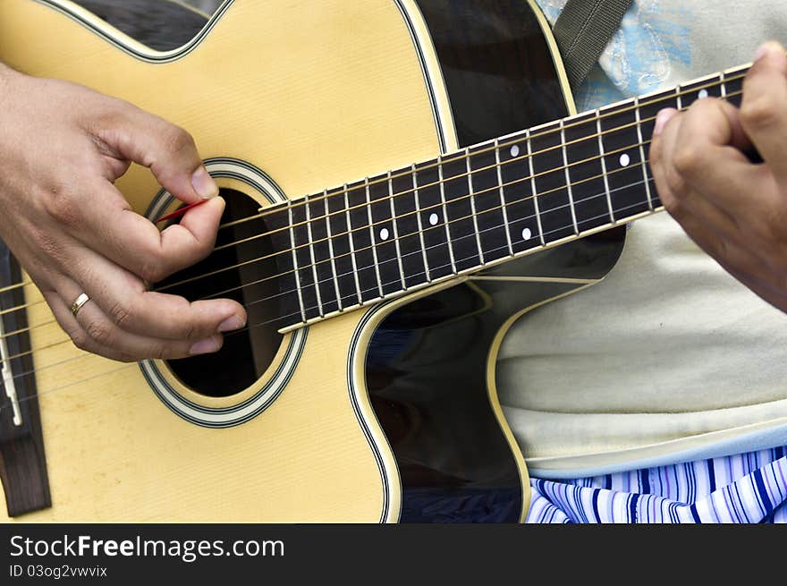 Playing guitar