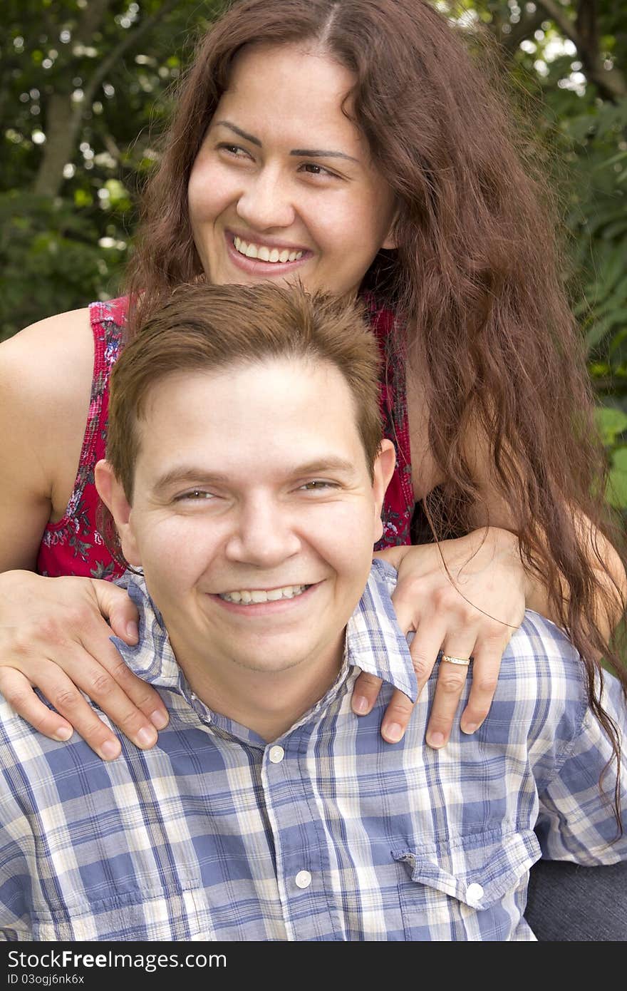 Happy couple having fun in the park.