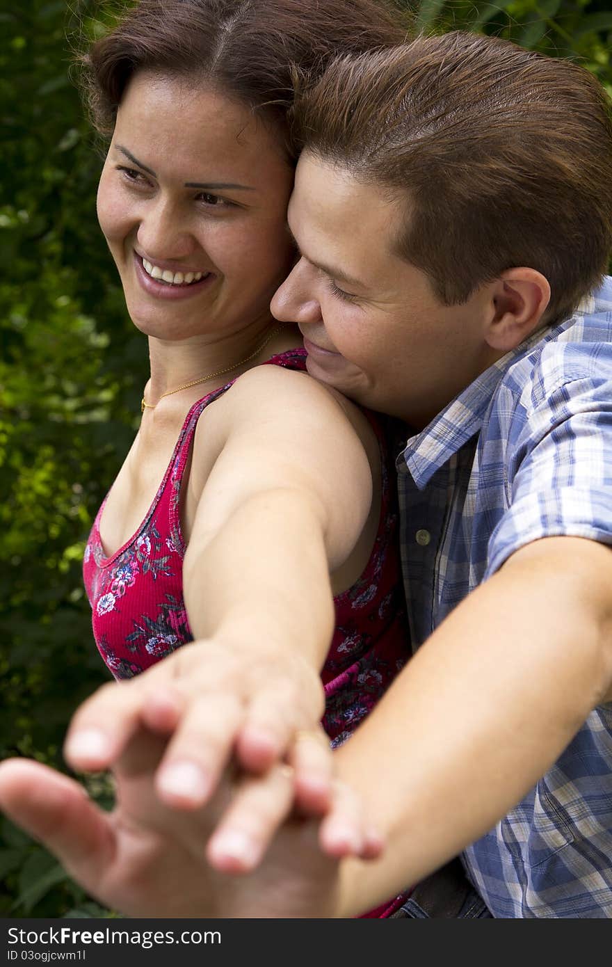 Very happy couple having fun in the park. Very happy couple having fun in the park.