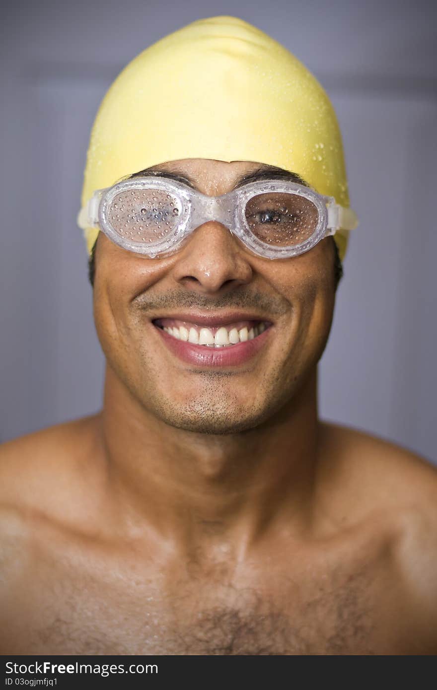 Wet guy dressed in a swimming suit. Wet guy dressed in a swimming suit.