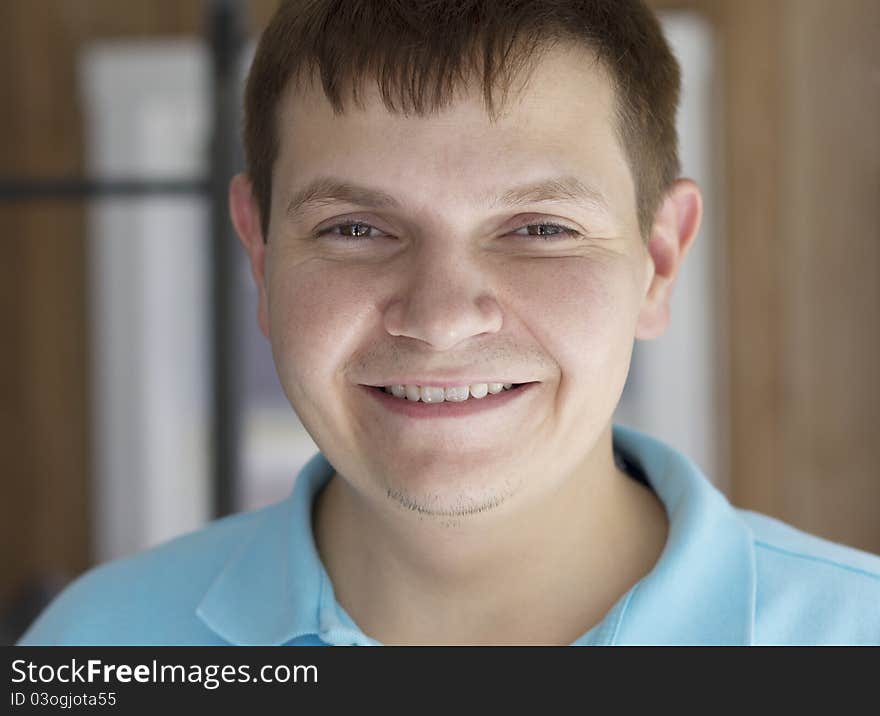 Very happy and smiling guy at home. Very happy and smiling guy at home.