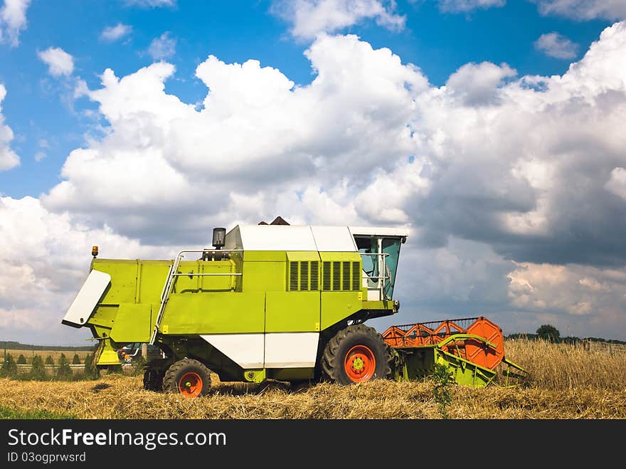 Working agicultural machinery in sunny day, machinery series