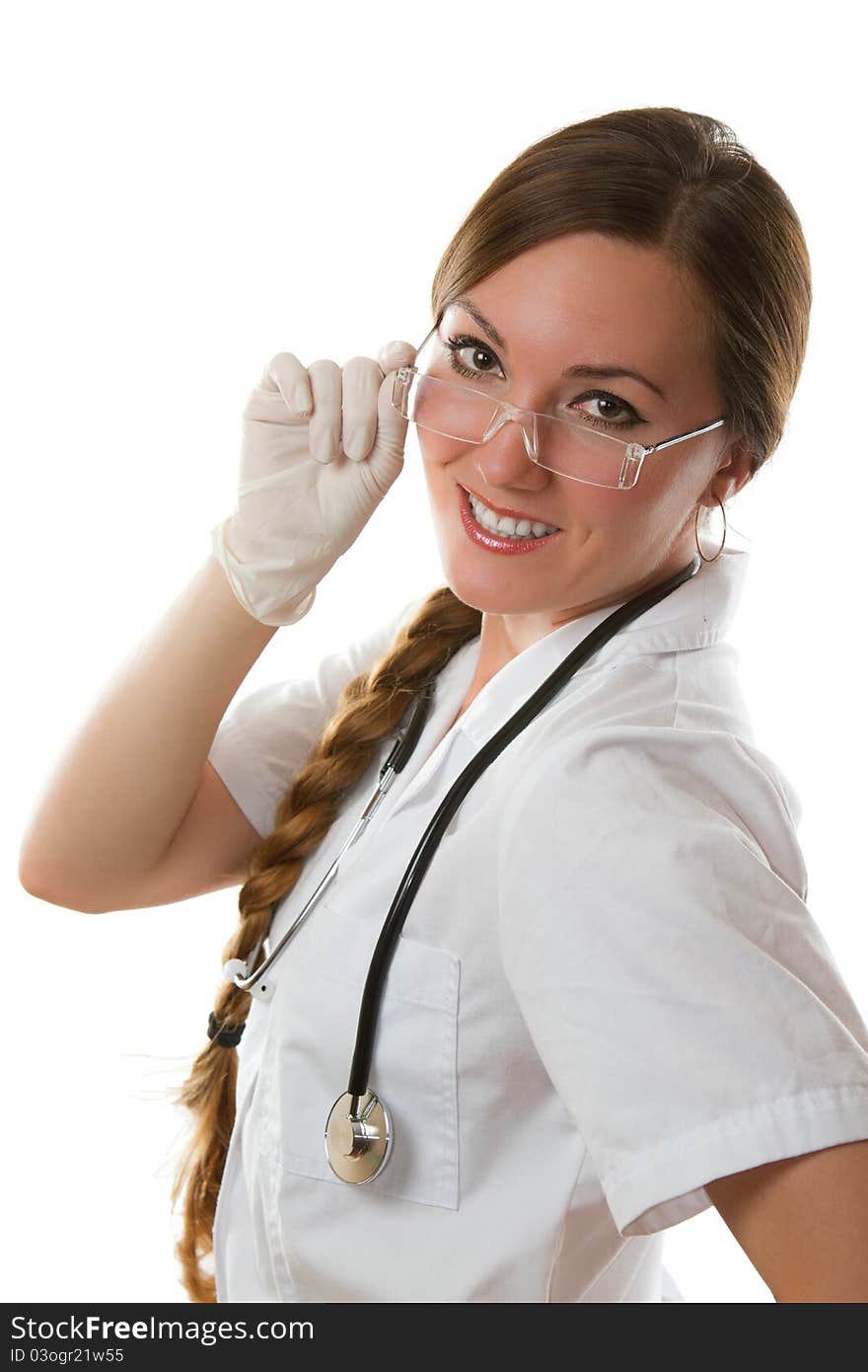 Young doctor with long hair wearing glasses and rubber gloves, sterile on the isolated white background. Young doctor with long hair wearing glasses and rubber gloves, sterile on the isolated white background