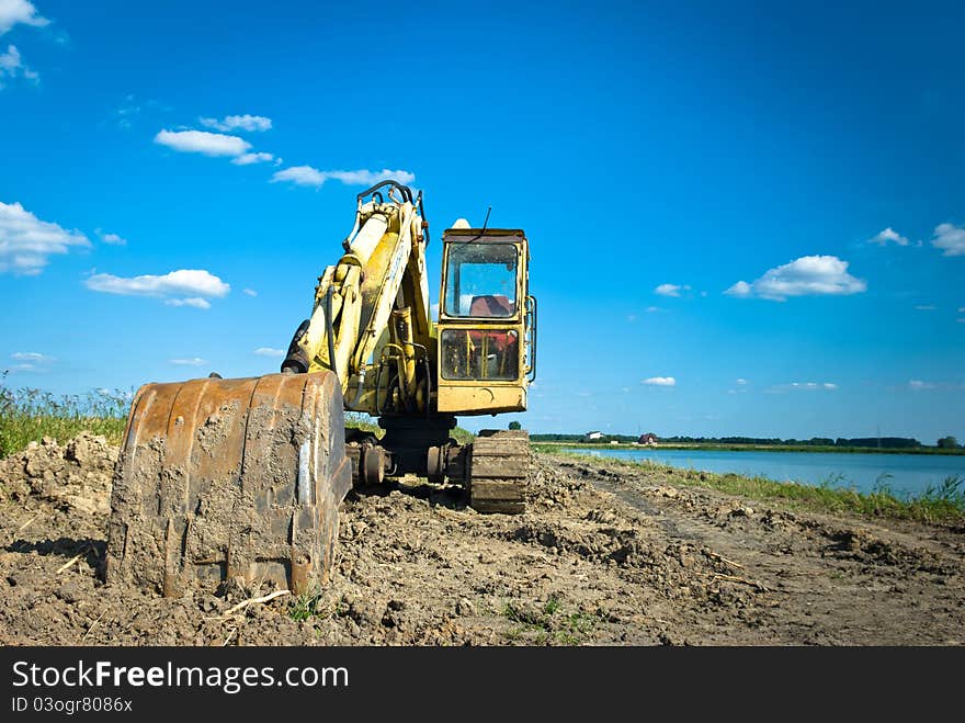 Digger, Heavy Duty construction equipment parked at work site