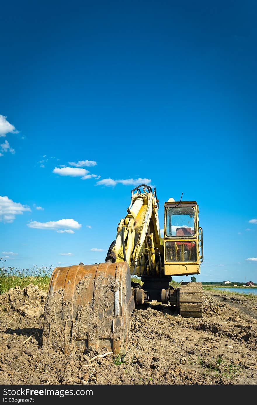 Digger, Heavy Duty construction equipment parked at work site