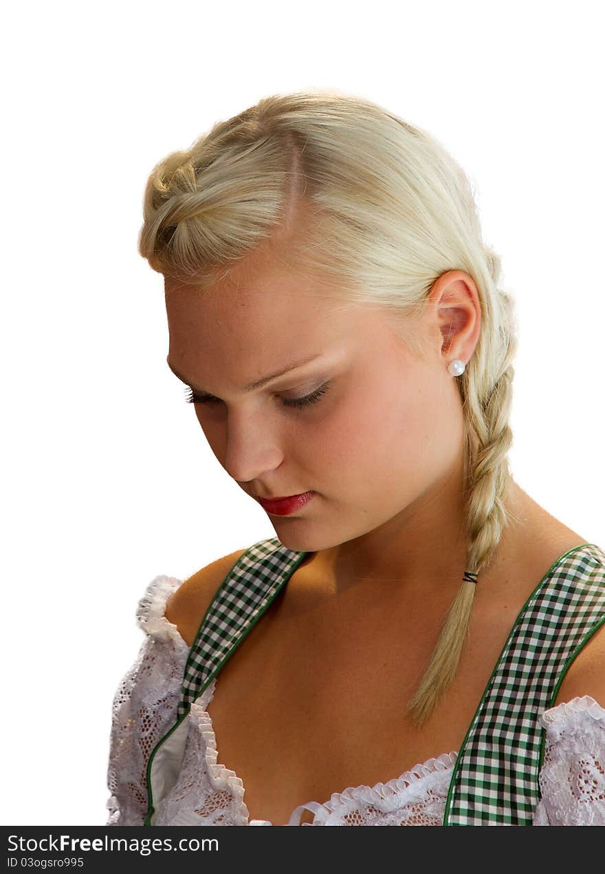 Young girl in dirndl praying. Young girl in dirndl praying