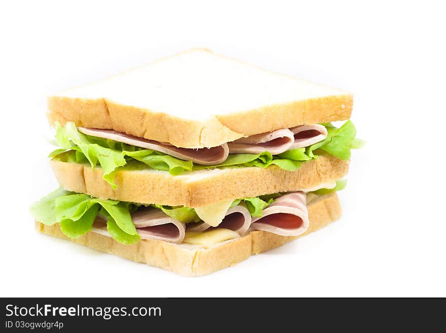 Ham and cheese sandwich on white background. Ham and cheese sandwich on white background