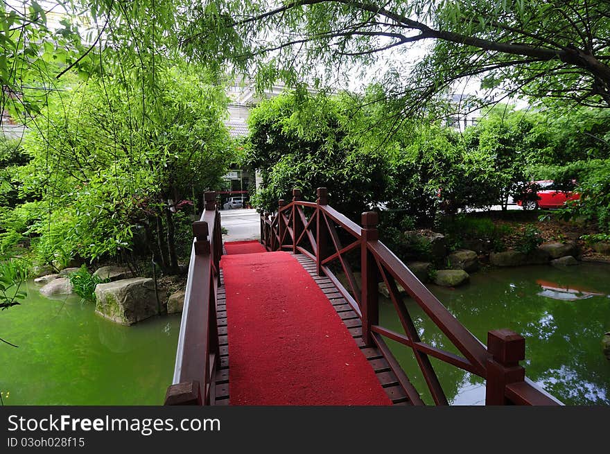 Asian beautiful garden with bridges tree. Asian beautiful garden with bridges tree