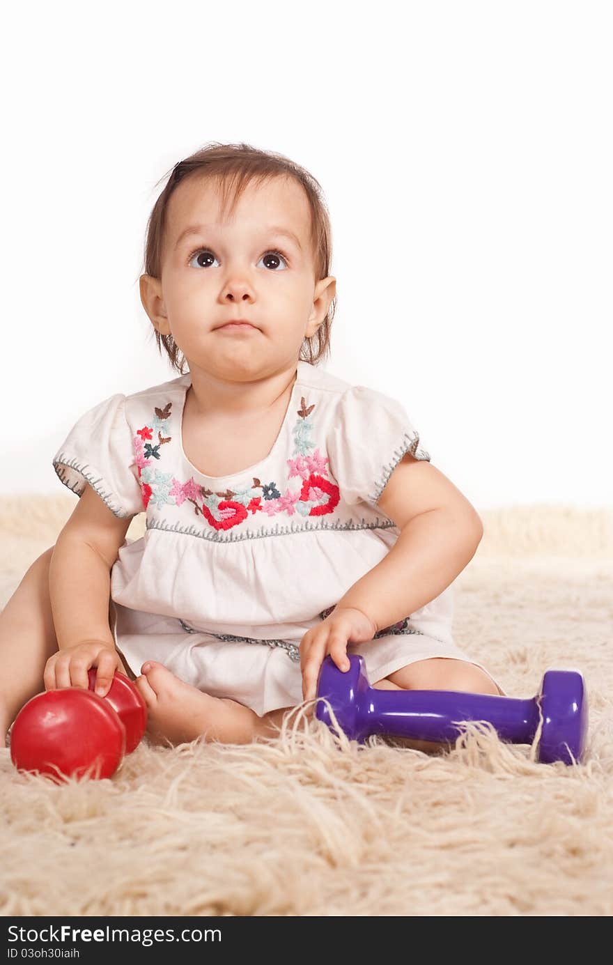 Girl Playing On Carpet