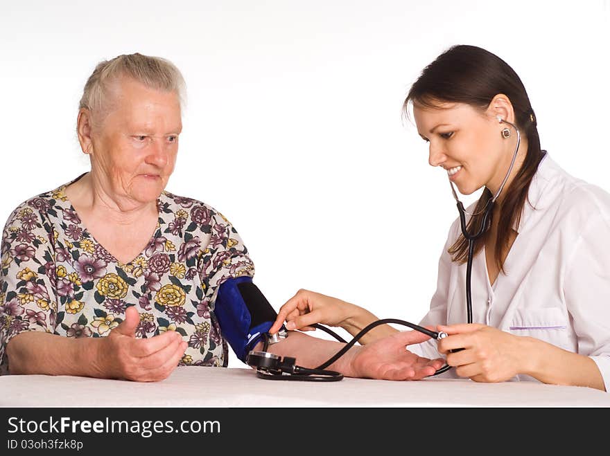 Cute nurse with an old patient. Cute nurse with an old patient