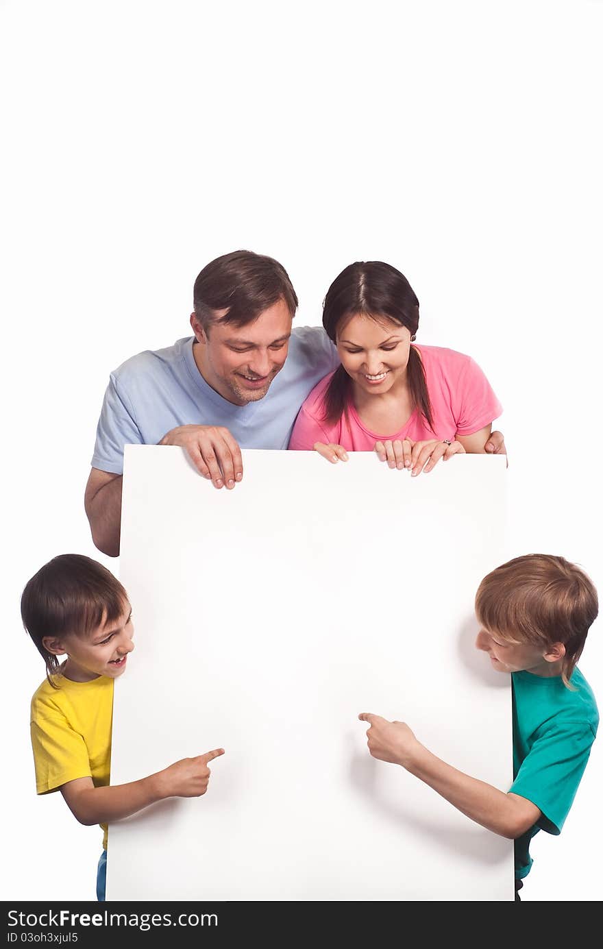 Happy family of a four smiling on white. Happy family of a four smiling on white