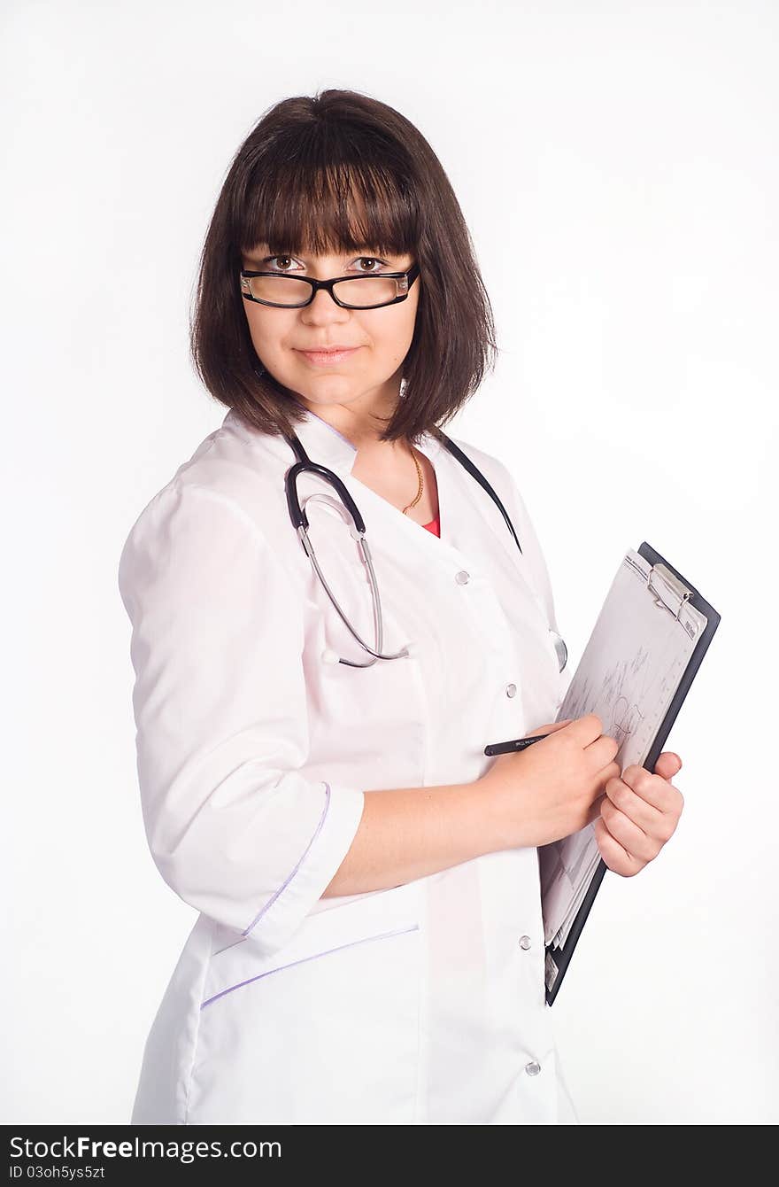 Cute nurse standing on a white background. Cute nurse standing on a white background