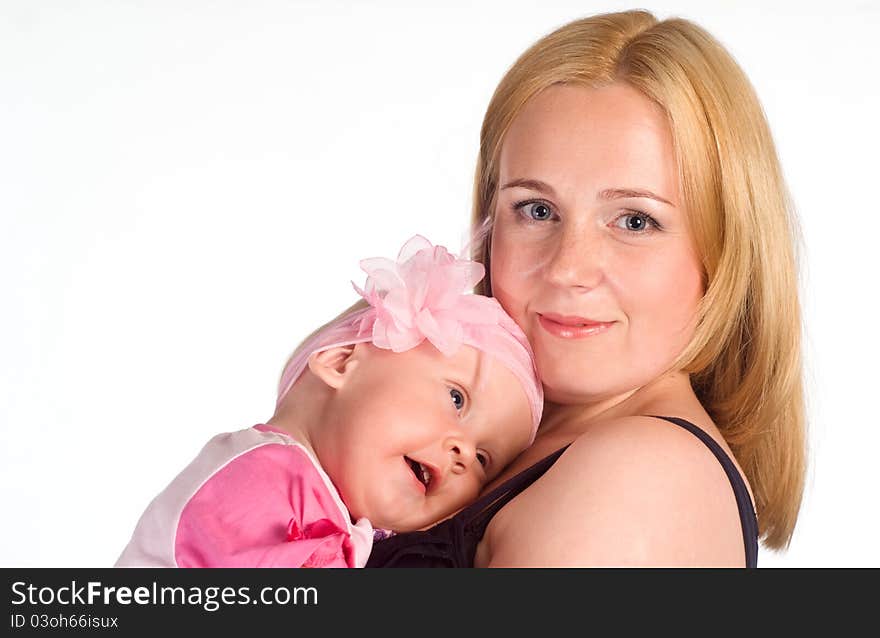 Cute mom with daughter on a white. Cute mom with daughter on a white