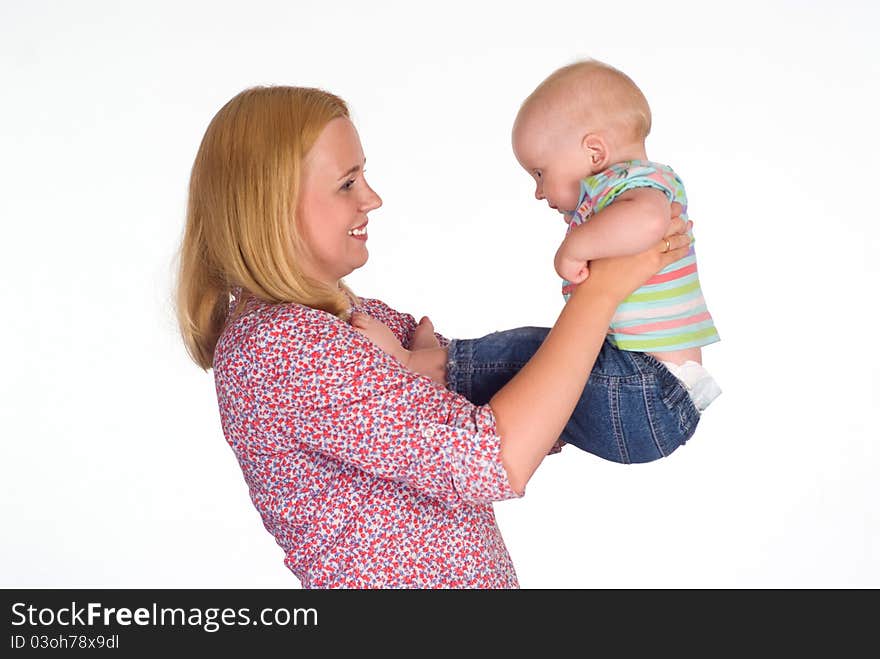 Cute mom holding her baby on whie. Cute mom holding her baby on whie