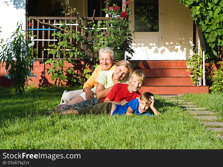 Grandsons with grandparents playing