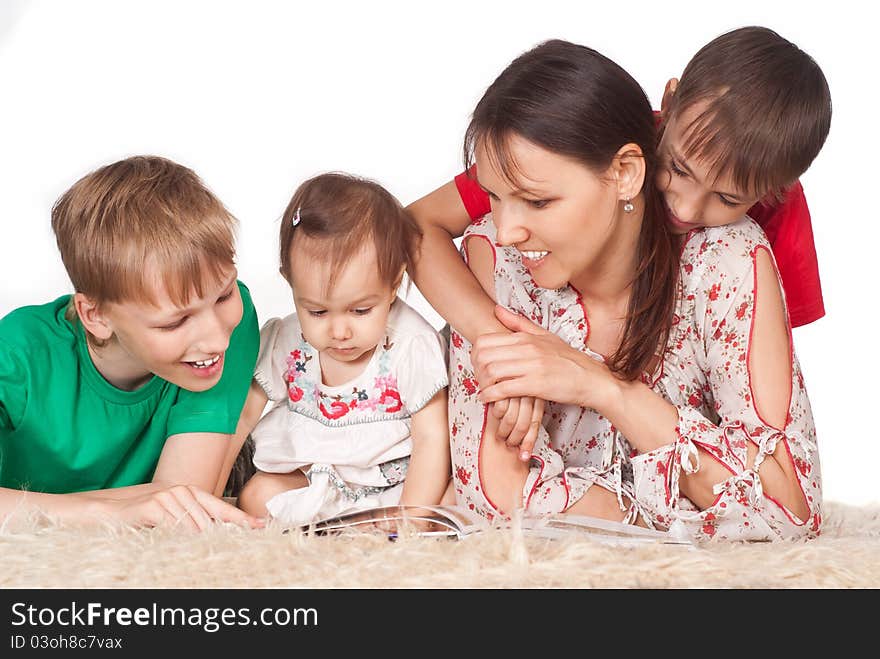 Portrait of a cute family at carpet