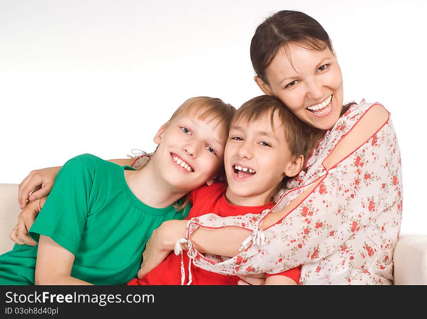 Cute family of a three on sofa. Cute family of a three on sofa