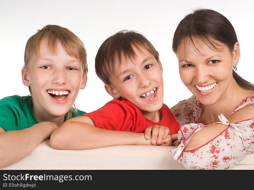 Cute family of a three on sofa. Cute family of a three on sofa