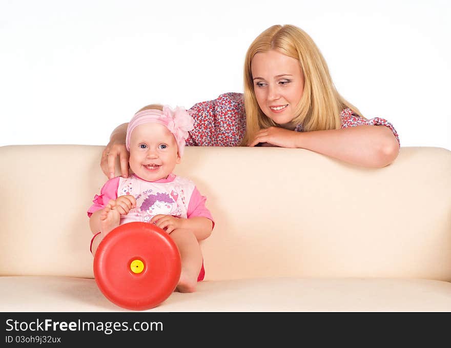 Mom Sits With Her Baby