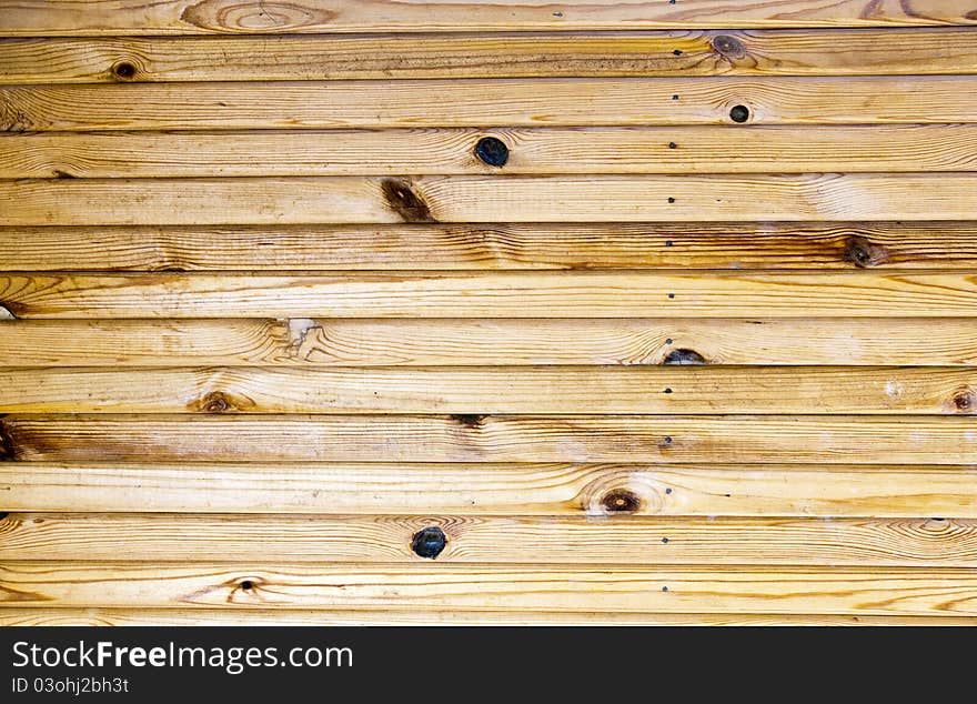 The texture of old scratched wooden planks. The texture of old scratched wooden planks