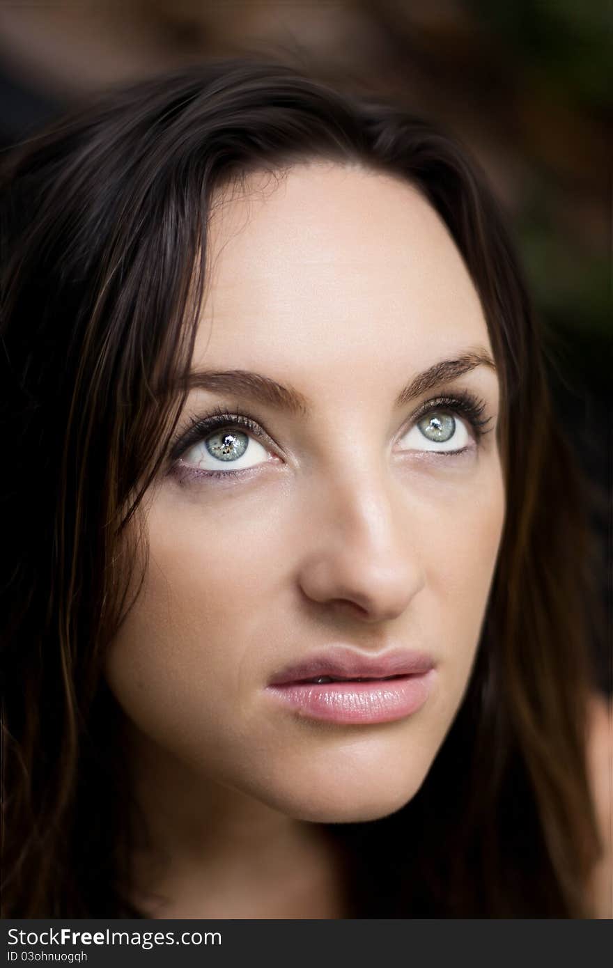 Beautiful woman looking up