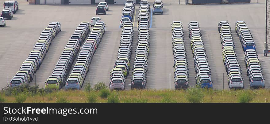 Rows of many parked cars. Rows of many parked cars.