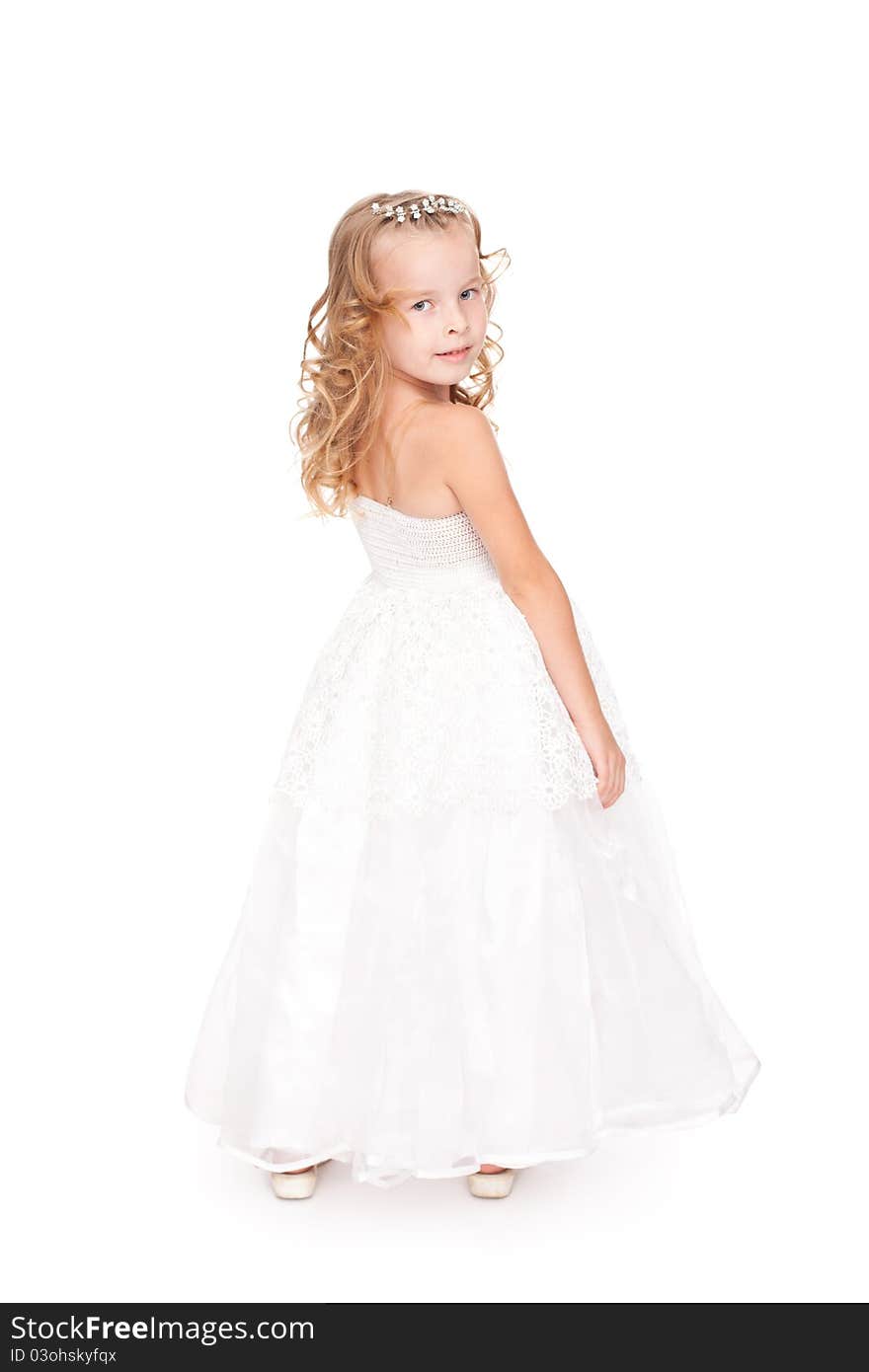 Pretty little girl in beautiful white dress