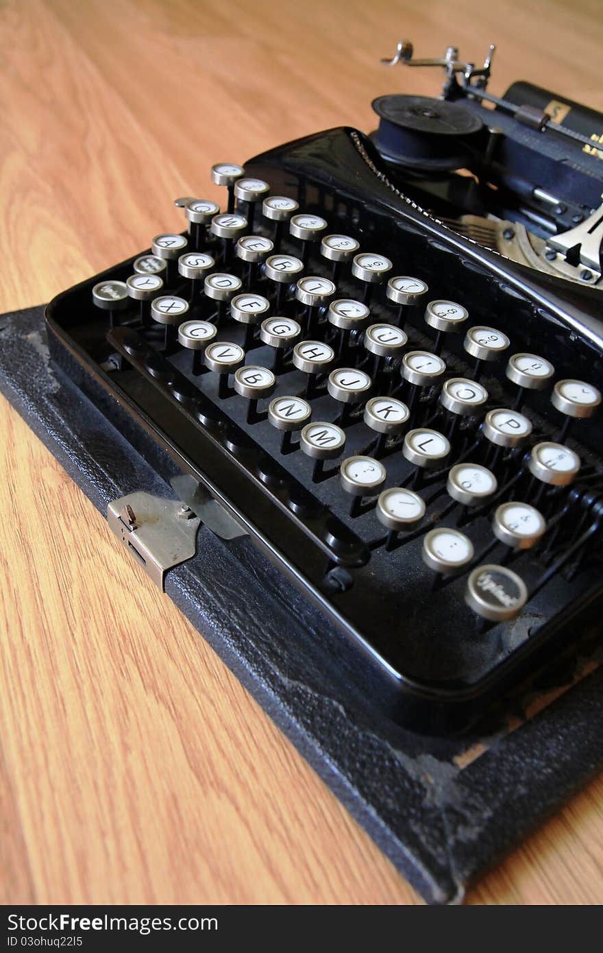 Old black typewriter with white letters. Old black typewriter with white letters