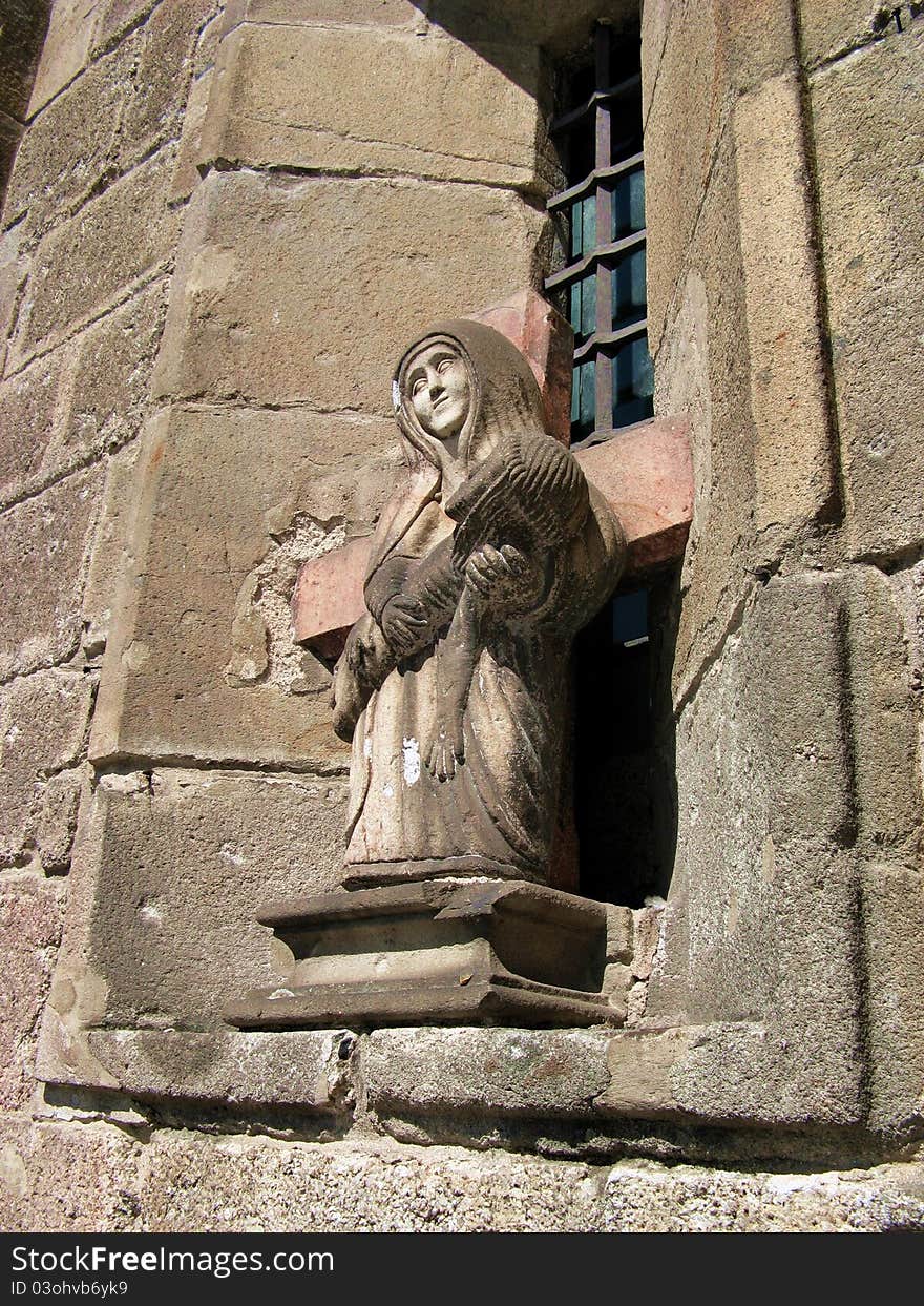 The statue representing the Piety on the facade of Sao Goncalo Church in Amarante (Portugal). Sao Goncalo is considered the Portugal equivalent of Saint Valentine and several lonely hearts come here every year to touch the statue of the Saint, hoping to find theis true love. The statue representing the Piety on the facade of Sao Goncalo Church in Amarante (Portugal). Sao Goncalo is considered the Portugal equivalent of Saint Valentine and several lonely hearts come here every year to touch the statue of the Saint, hoping to find theis true love.