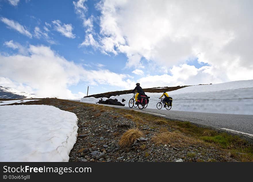 Group biking in high mountains in Norway. Group biking in high mountains in Norway