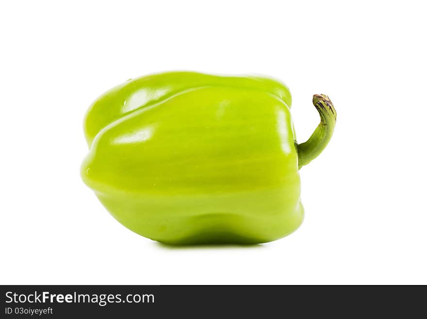 Sweet green pepper over white background