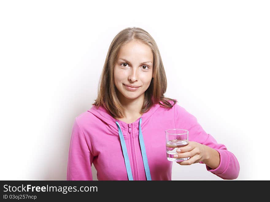 Woman with glass of water on white