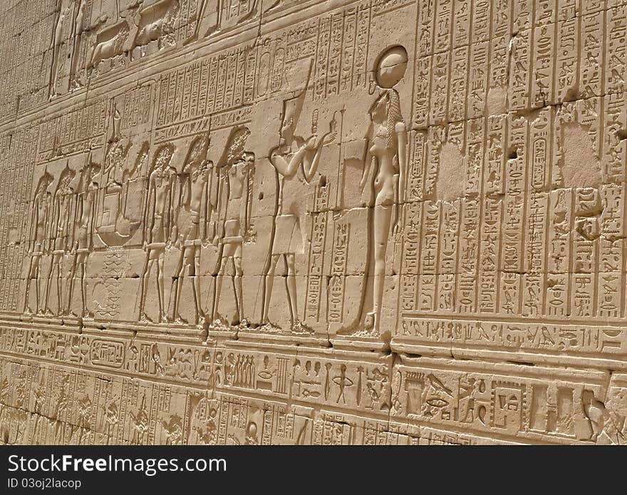 Hieroglyphic carvings in an Egyptian temple wall