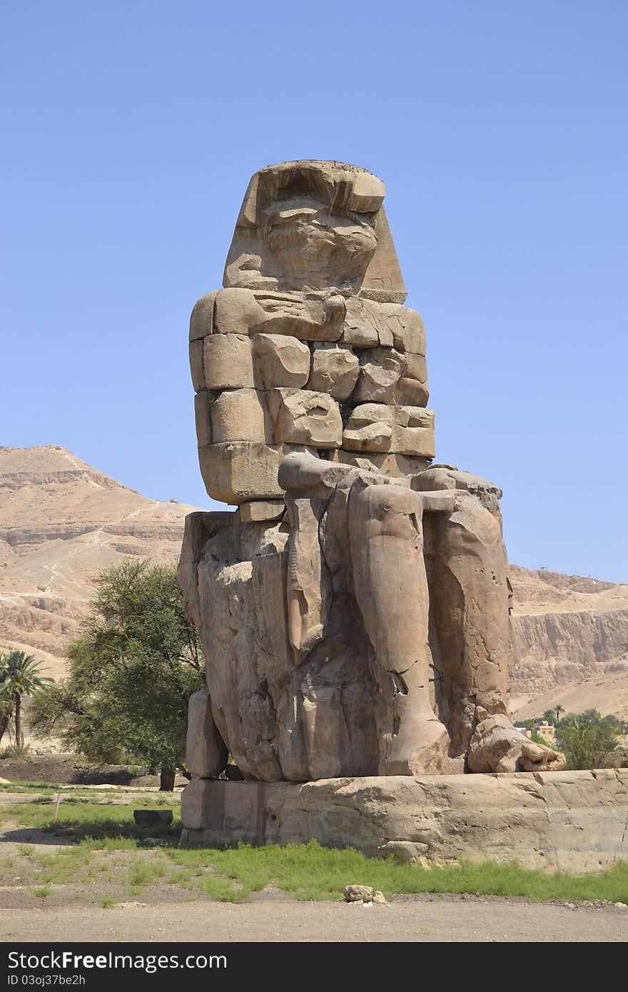 One of the colossus statues at the Temple of Memnon. One of the colossus statues at the Temple of Memnon