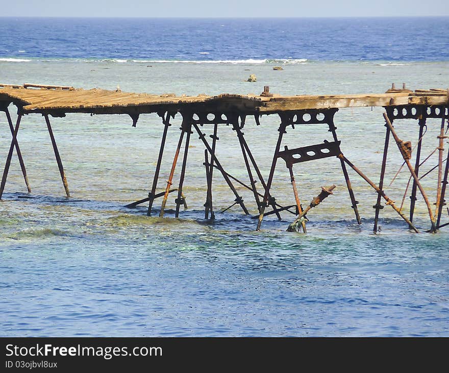 Old Jetty On A Coral Reef