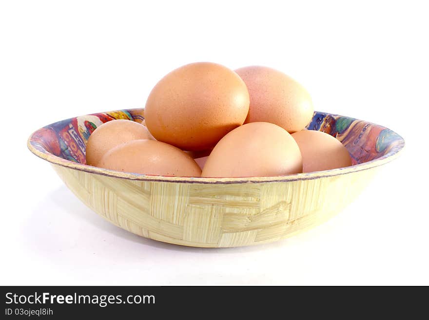 Bowl filled with uncooked whole white eggs. Bowl filled with uncooked whole white eggs