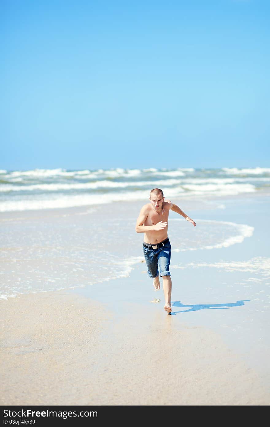 Handsome man on the sanny beach. Handsome man on the sanny beach